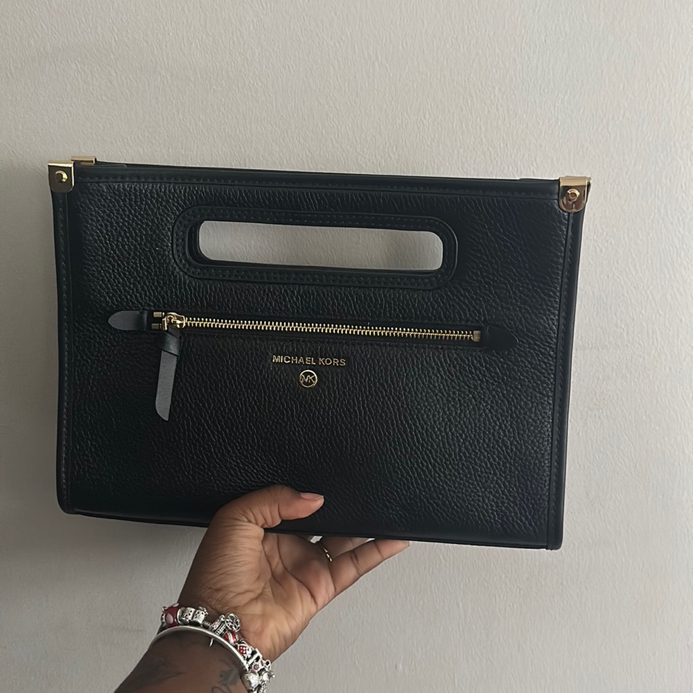 Micheal Kors black leather clutch